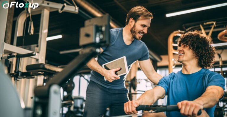 Partnership Marketing for Gyms – trainer guiding client during workout session in modern fitness center