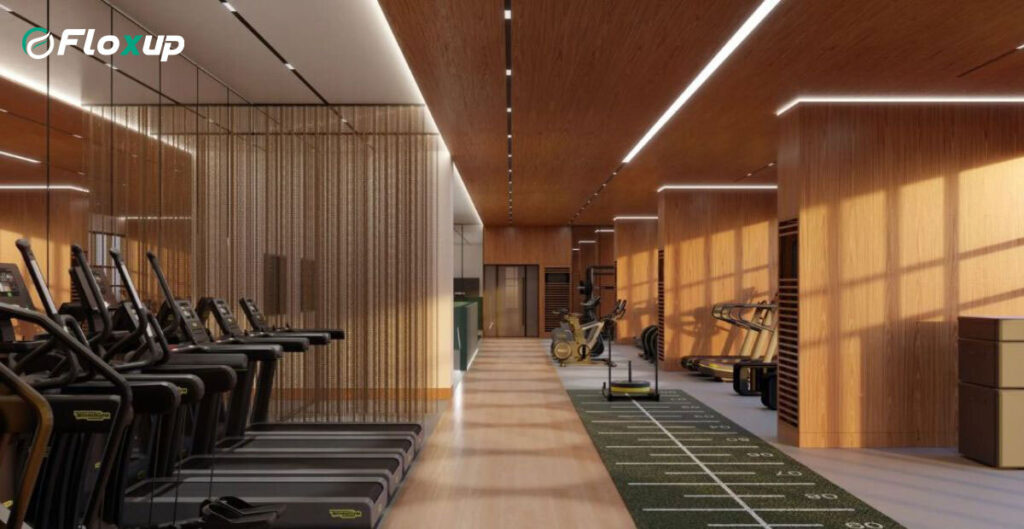 Modern gym interior design with wooden finishes, treadmills, and training area